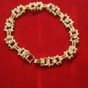 Elegant Gold Bracelet with Silver Accents